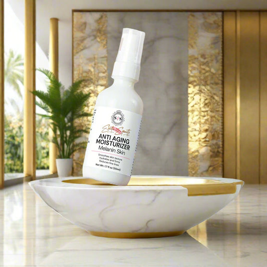 Hand holding a bottle of anti-aging moisturizer for Melanin skin tone cosmetics skincare by Shuntia Symonette