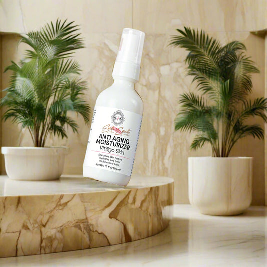 Hand holding a bottle of anti-aging moisturizer 